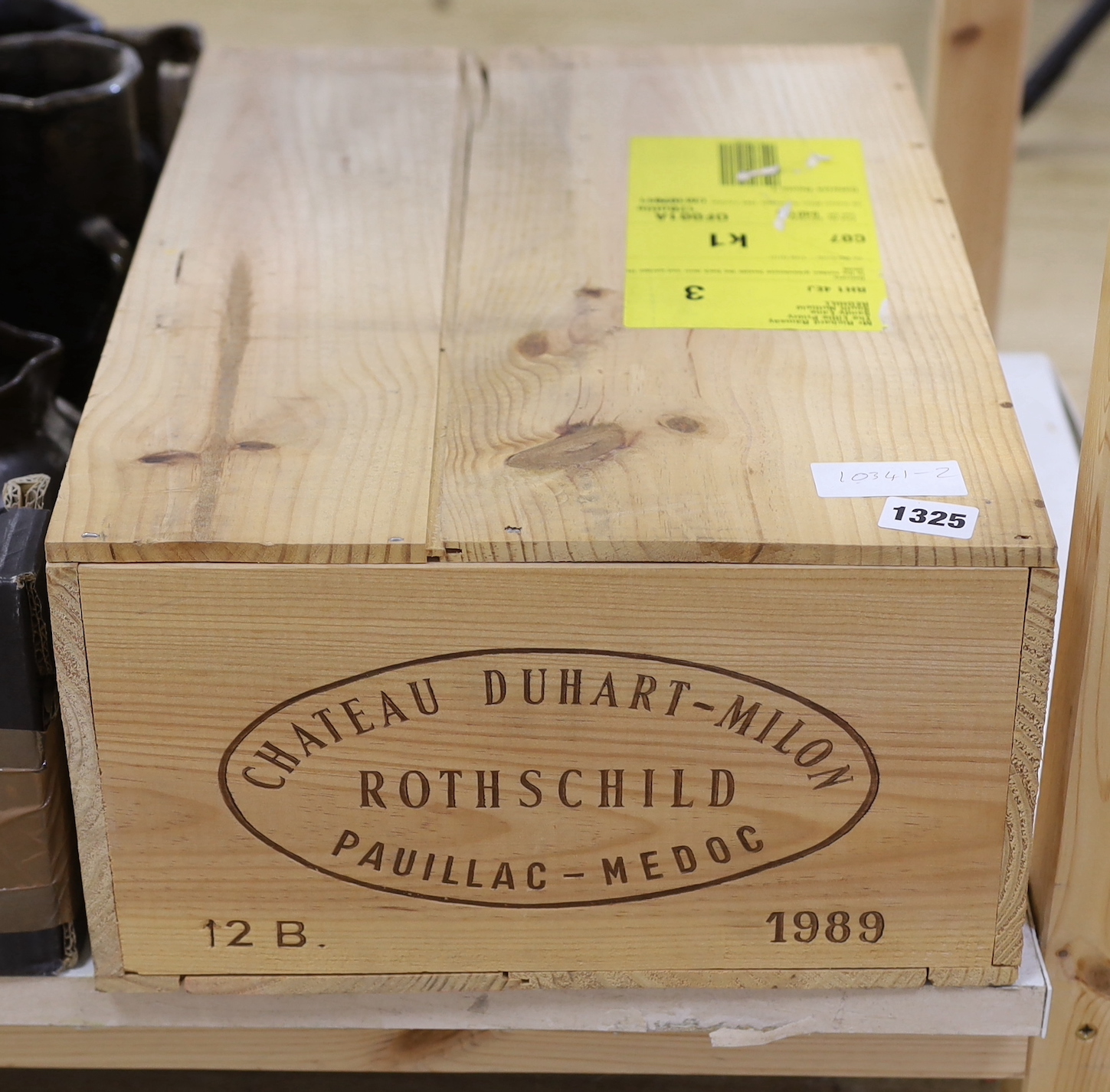 Twelve bottles of Chateau Duhart Milon, 1989, in OWC, purchased from The Wine Society.